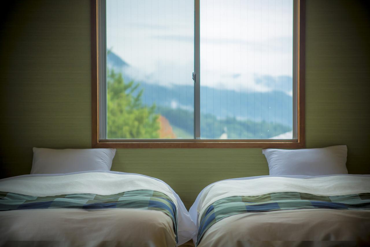 Hotel Hakuba Berghaus Otari Bagian luar foto
